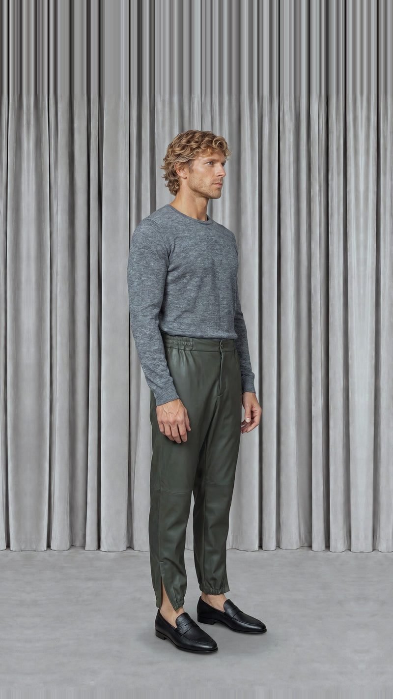 Christina Tracksuit Pants Vegan Leather Olive Men, model side – POAN