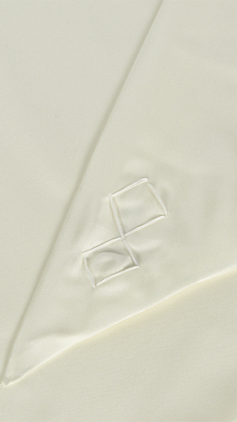 Scala Tubular Scarf Ivory – stitched point, close-up