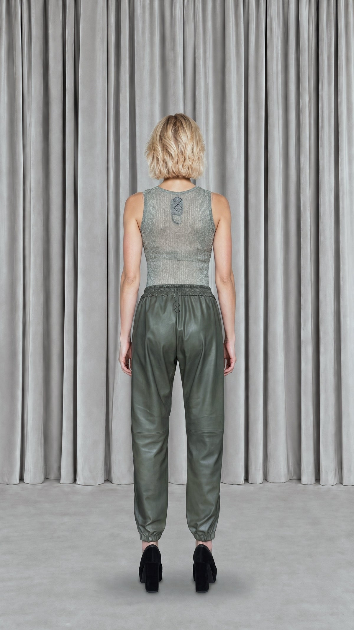 Christina  Tracksuit Pants Vegan Leather Olive Women, model back – POAN