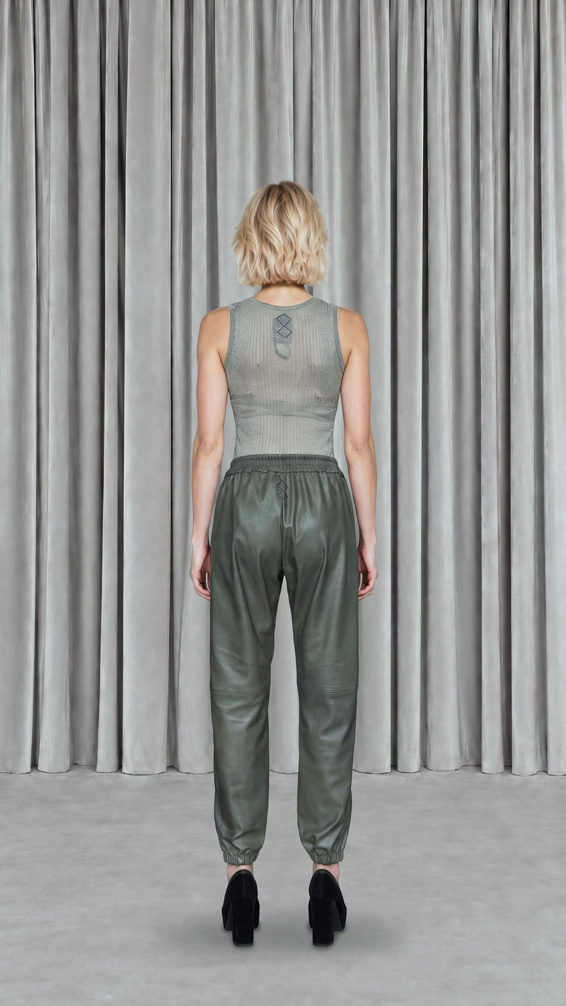 Christina  Tracksuit Pants Vegan Leather Olive Women, model back – POAN
